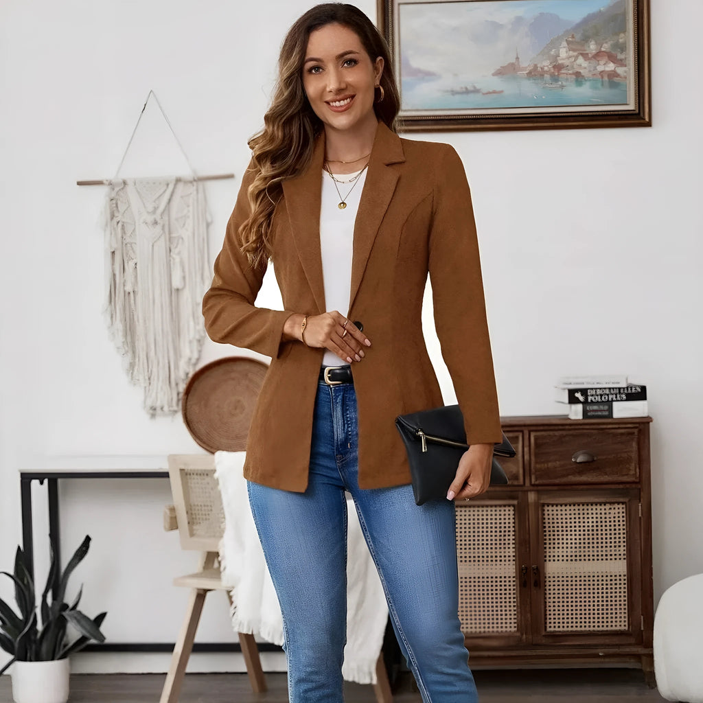 Brown men's single-breasted casual blazer with lapel collar and long sleeves on a hanger.