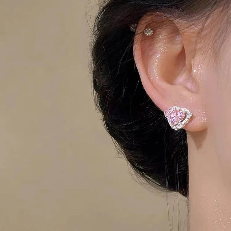 Guardian Heart white K gold tone electroplated copper stud earrings with heart shape design