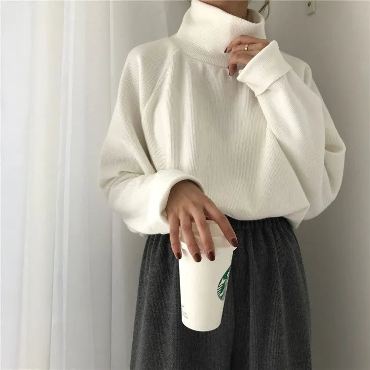 Women's loose fit half-high collar long sleeve top in solid apricot colour