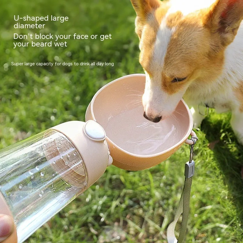 Portable dog water bottle and attached feeding bowl in yellow, pink, or brown for outdoor travel.