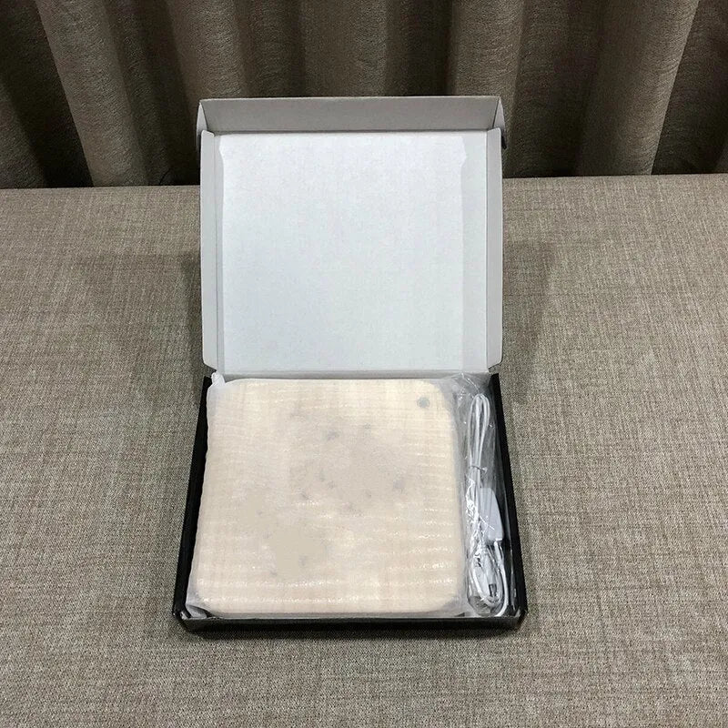 Square pine wood USB LED atmosphere lamp emitting warm white light, showing its 3D design and button switch.