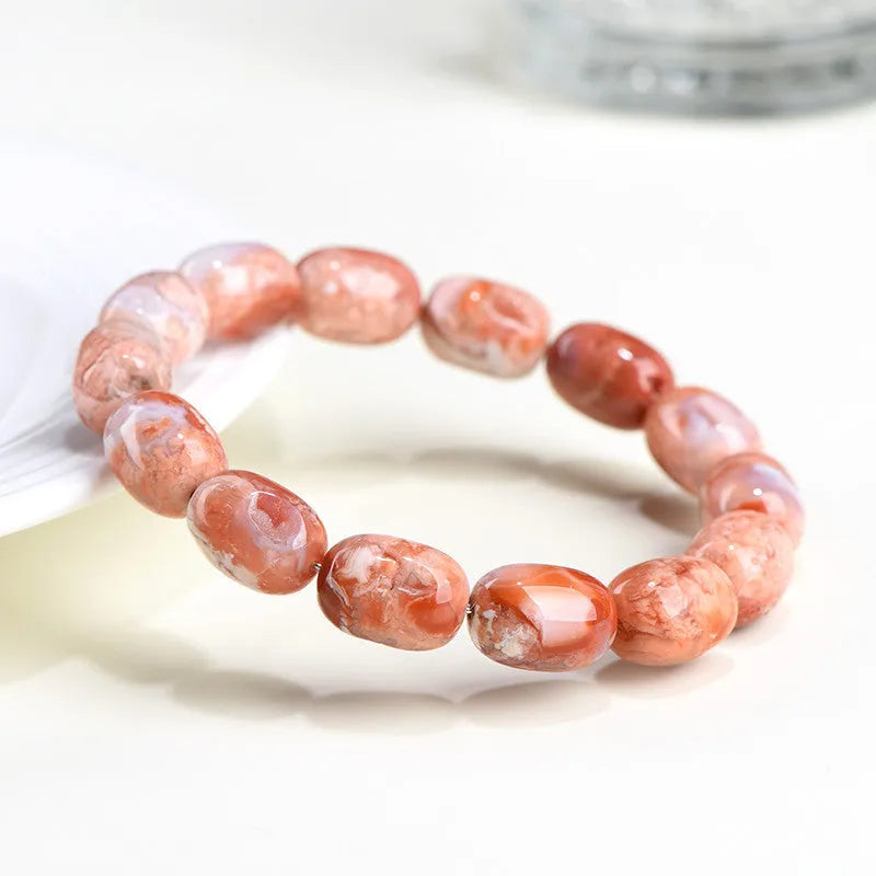 Natural cherry agate barrel bead bracelet with Ruyi pattern measuring 10x14mm