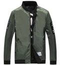 Reversible men's thin flight jacket in striped pattern with zipper, shown in black, blue, and green colours.