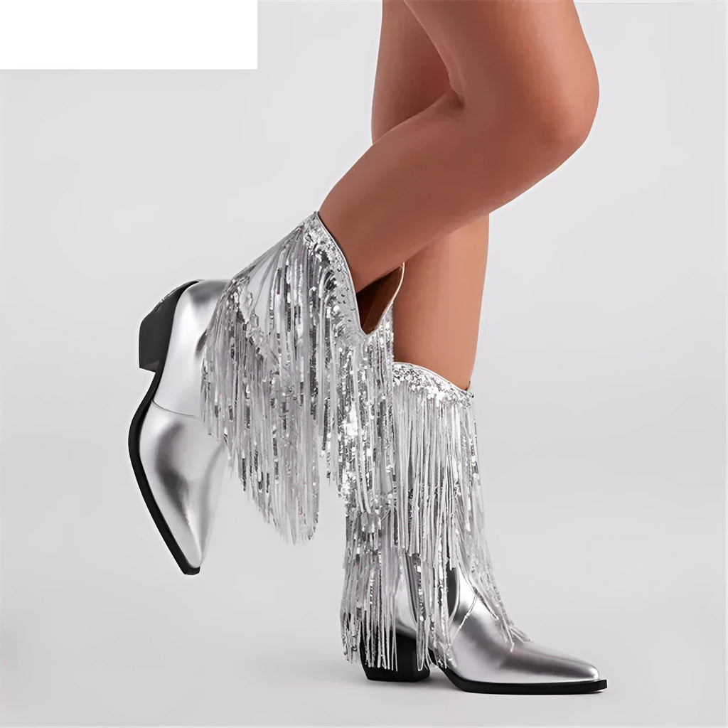 Women's black chunky heel tassel boots with stiletto heel and pointed toe on a white background.