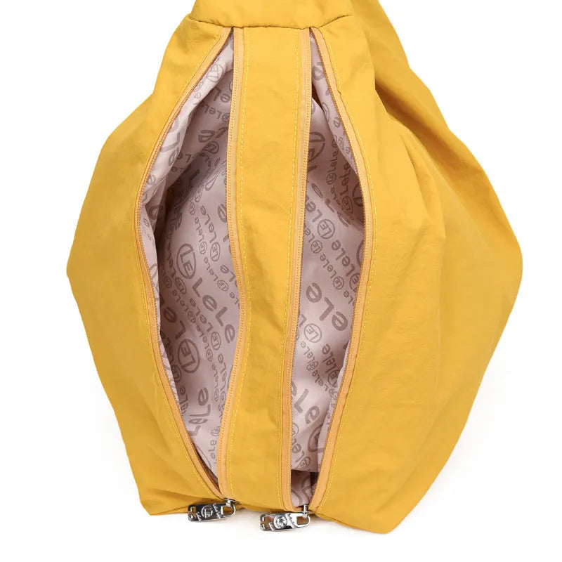 Women's heart-shaped underarm bag in nylon with large capacity, shown in available colours
