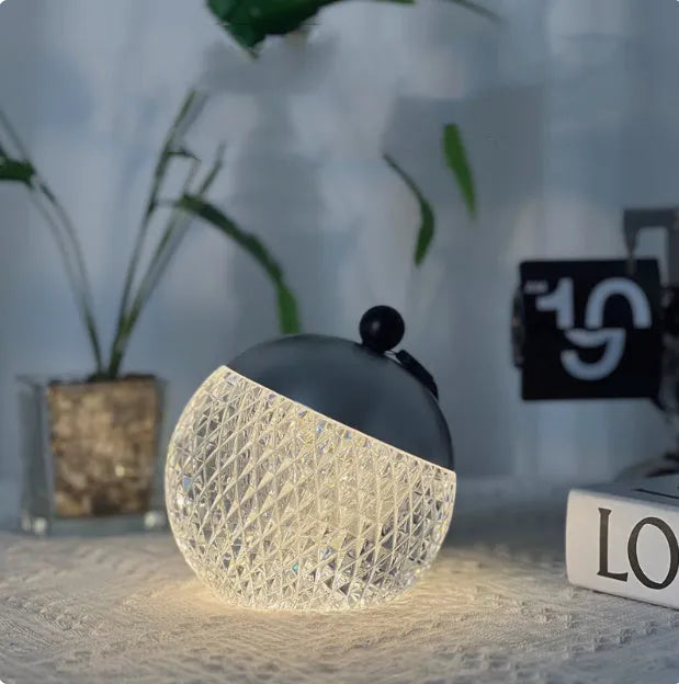 Portable dimmable touch lamp in modern minimalist design with chrome finish