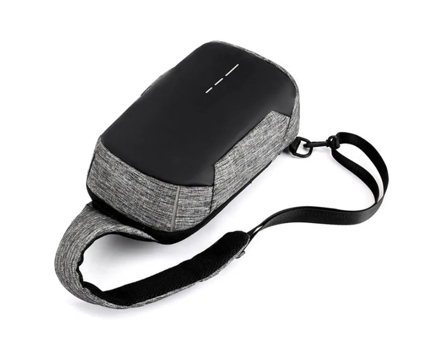 Dark blue waterproof Oxford cloth chest bag with zipper opening showing internal mobile phone compartment