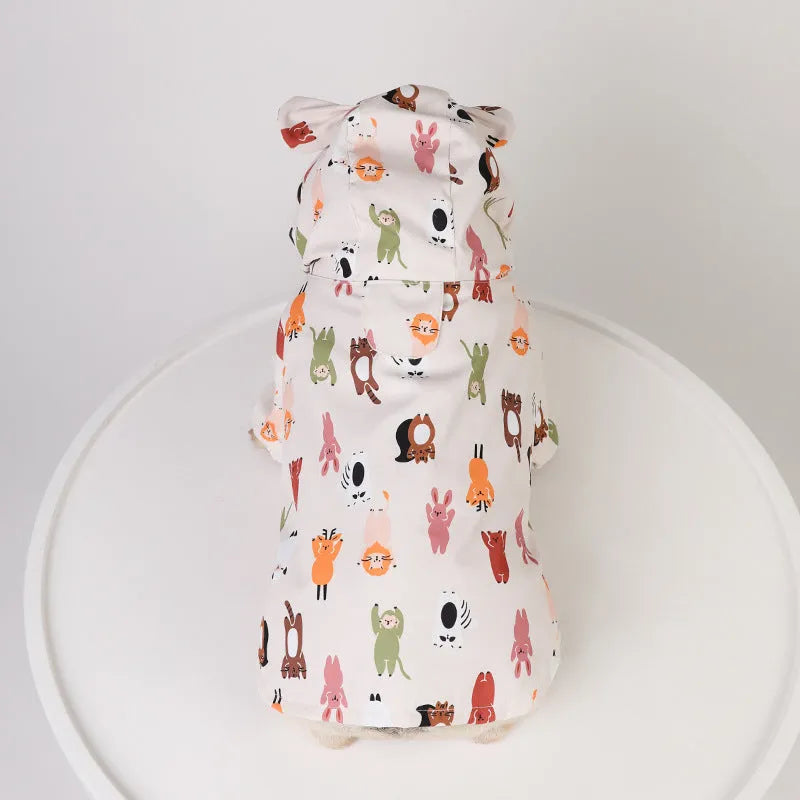 Beige cartoon pattern dog raincoat with double waterproof coating in sizes from small to extra-extra-large