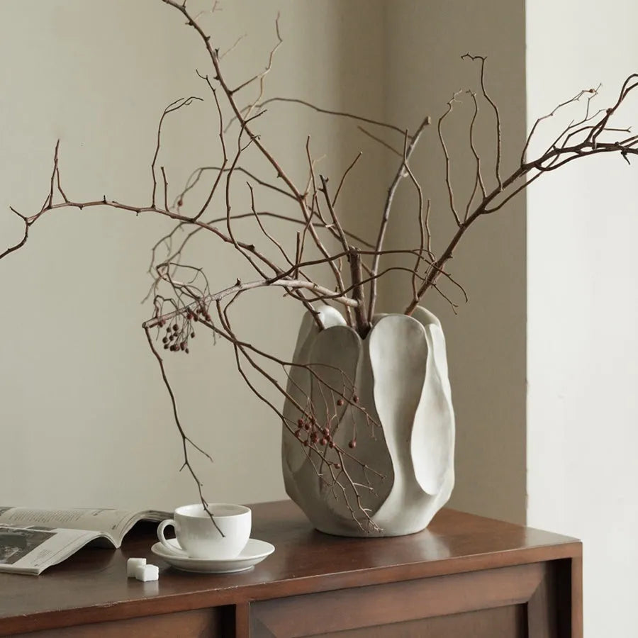Handmade irregular ceramic art vase in low style and high style sizes for flower arrangements.