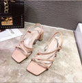 Women's apricot thick wedge heel sandals with a single strap and side cut-outs on a white background.