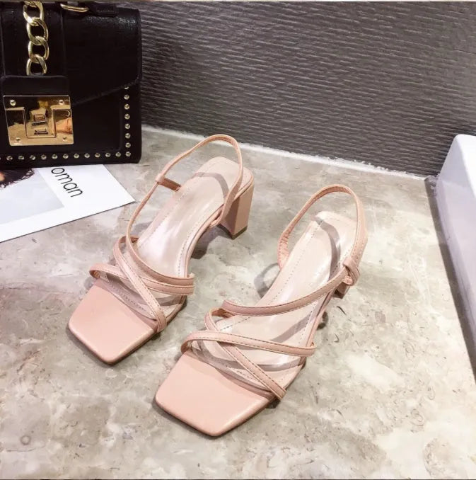Women's apricot thick wedge heel sandals with a single strap and side cut-outs on a white background.