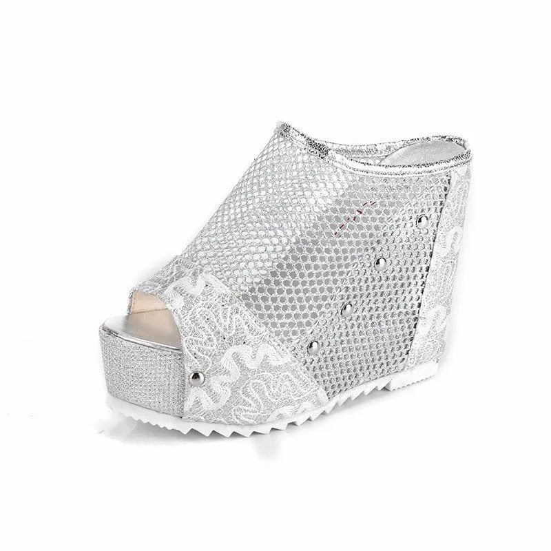 Women's black mesh flip flops with a chunky platform sole featuring a hollowed-out heel design.