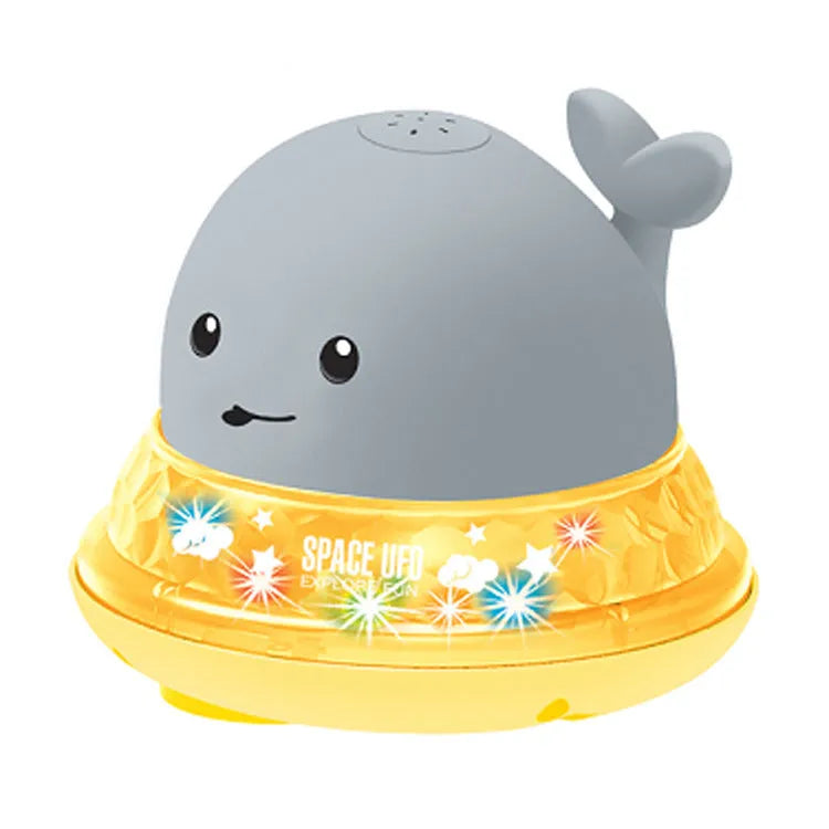 Automatic electric whale bath toy spraying water with flashing coloured lights