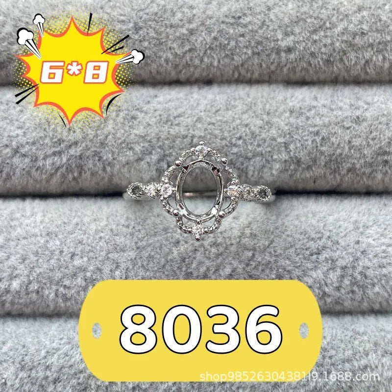 Oval denier ring with open mouth design, 6x8mm main stone and five-pointed star decoration