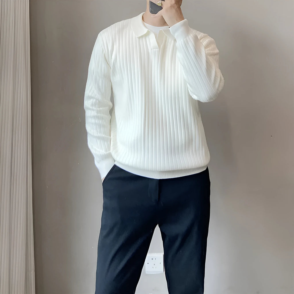 Men's loose grey knitted sweater with a textured striped lapel, shown on a model.