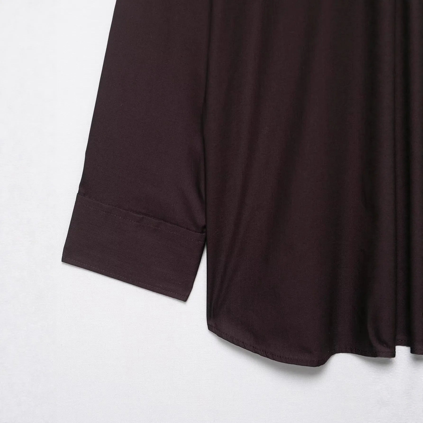 Brown loose-fit women's poplin shirt with long sleeves and a matching bow tie scarf, shown in a cardigan style.