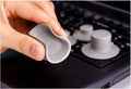Set of four grey durable plastic laptop cooling pads, two large and two small, on a flat surface.