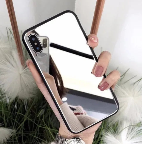 Black iPhone case with a reflective mirror surface on the back, compatible with iPhone X, 7, and 8 Plus.