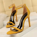Open-toe ankle-strap high heels in artificial PU with buckle closure, shown in multiple colours