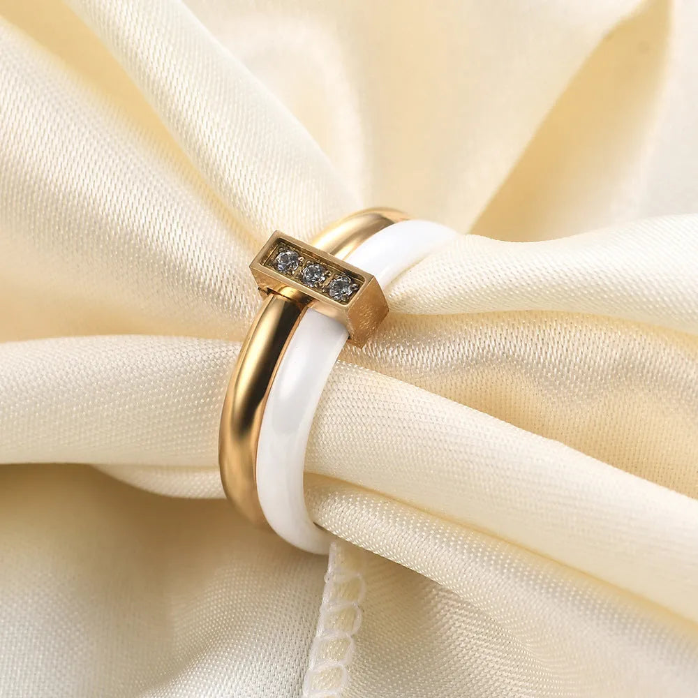 Women's ceramic ring with 6mm band width, geometric round shape, and glossy stitching detail in steel black finish