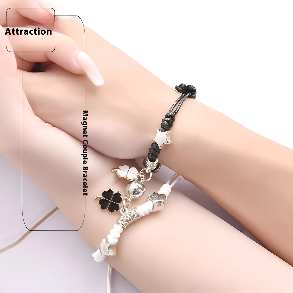 Magnetic couple bracelets with suction clasp showing various charm designs like a crown, clover, and love lock.