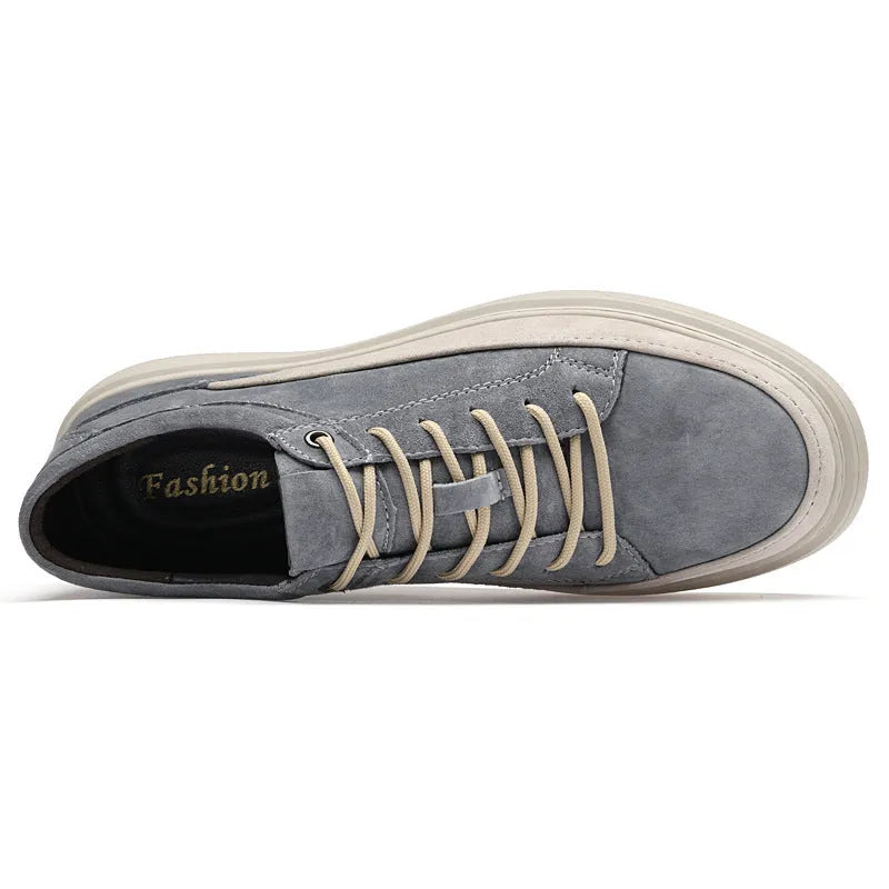 Men's grey casual leather skate shoes with round toe and low-top design on a rubber sole.