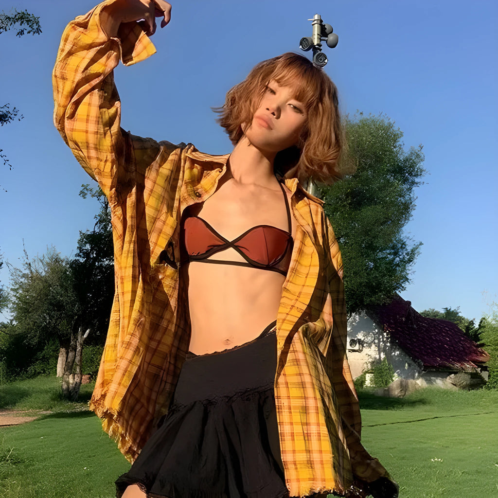 Yellow plaid cardigan shirt with loose fit and polyester blend fabric