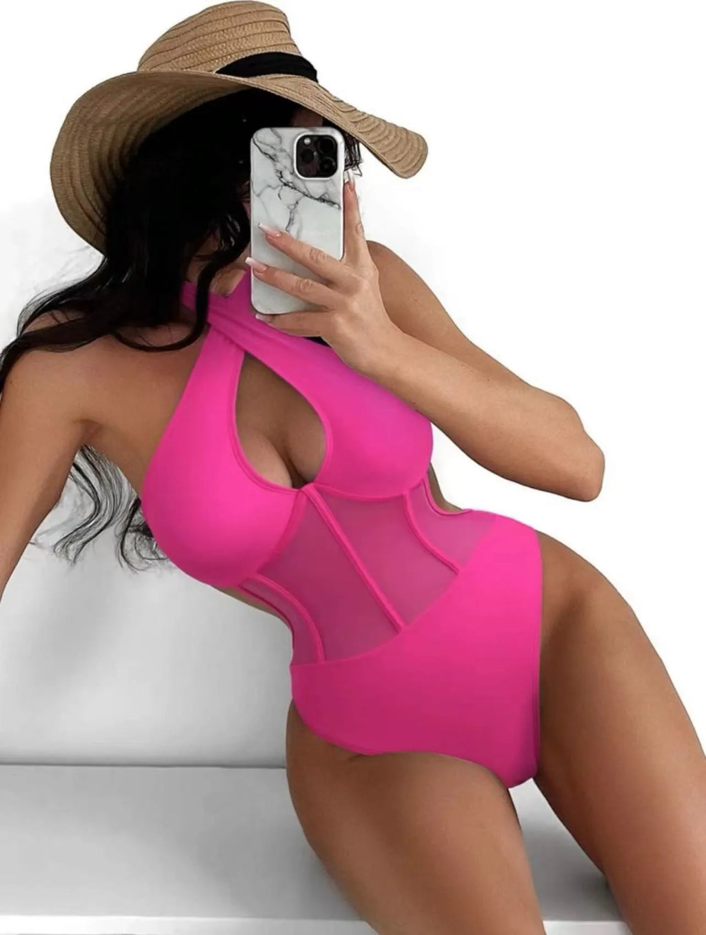 Women's black one-piece swimsuit made from nylon and spandex fabric on size mannequin