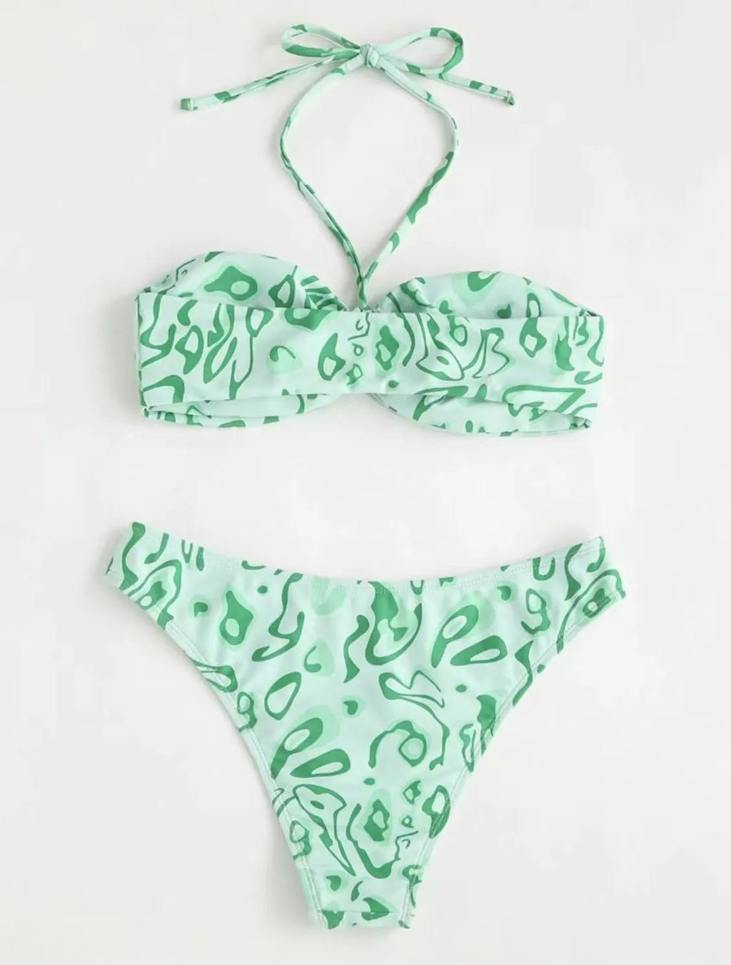 Women's blue floral bandeau bikini swimsuit with split style design on mannequin
