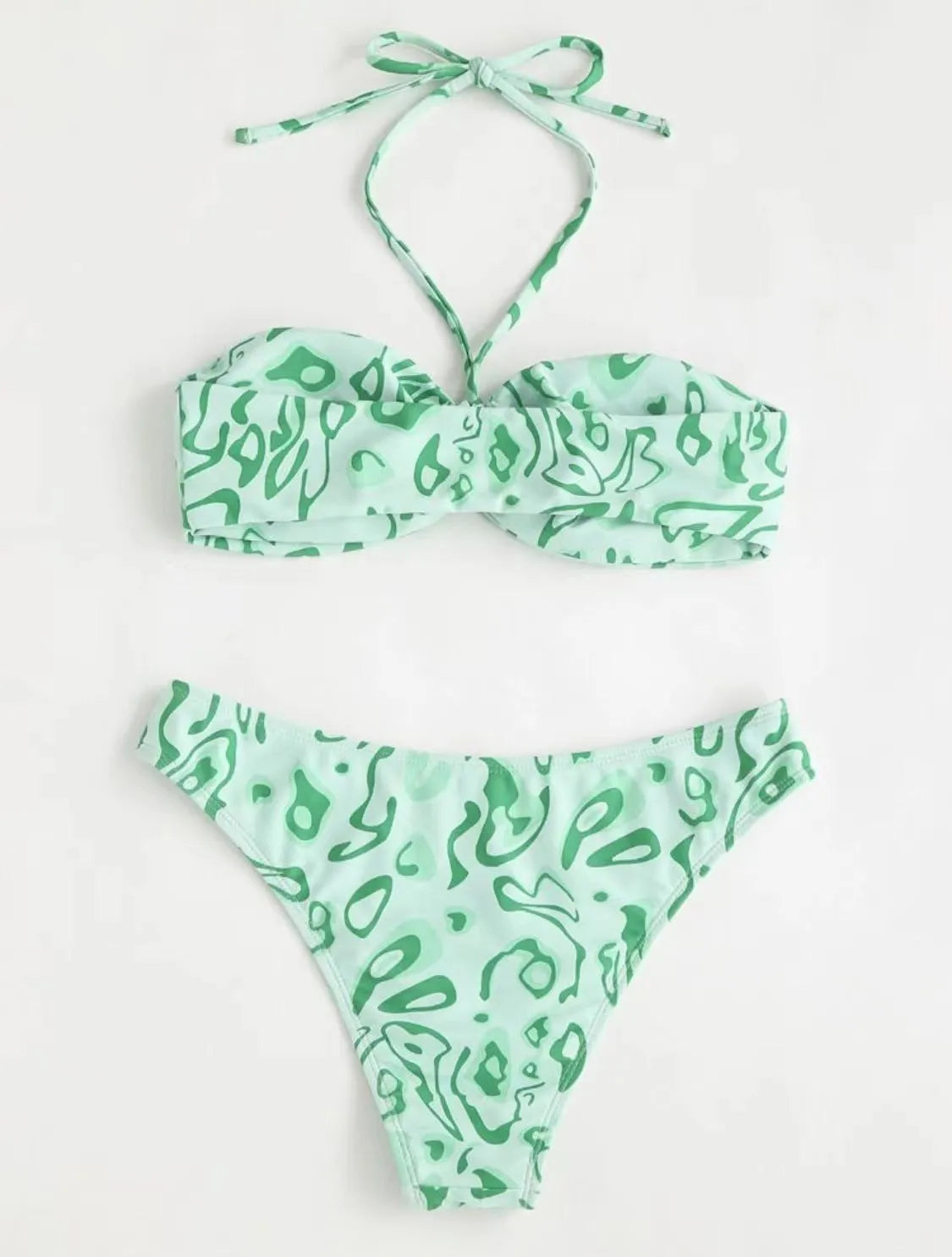 Women's blue floral bandeau bikini swimsuit with split style design on mannequin