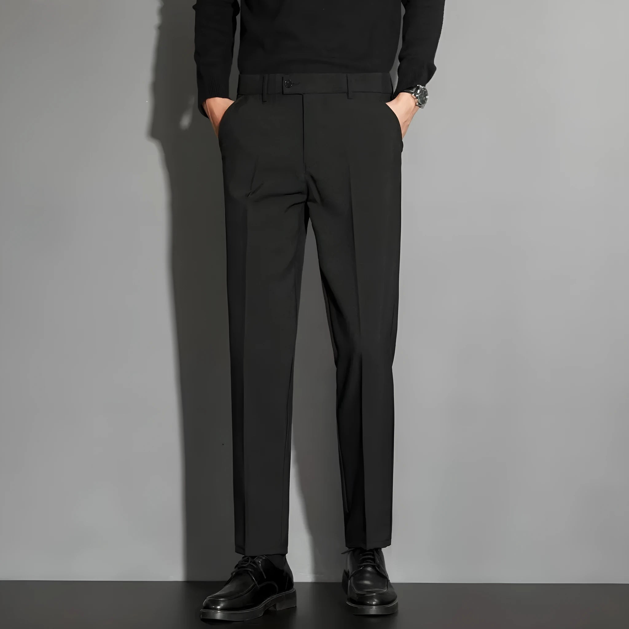 Men's straight cut suit trousers with ankle-length finishing in polyester blend fabric