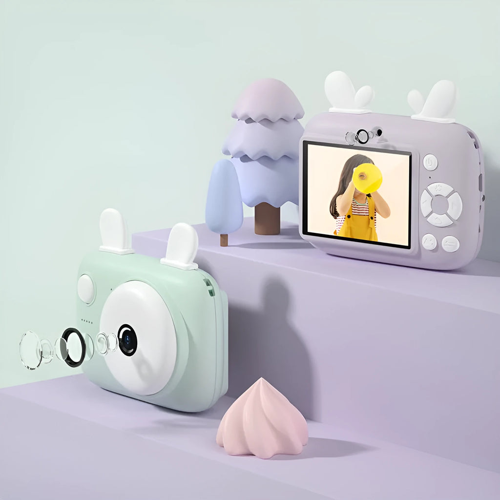 A2 Kids Macaron style digital camera in green colour, showing front and rear lenses and 2.4 inch screen.