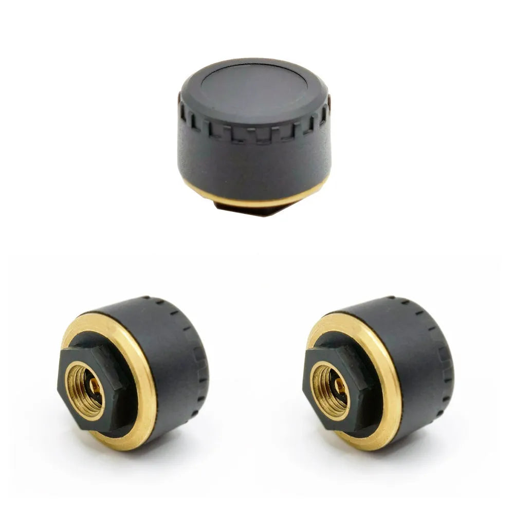 Bluetooth tyre pressure monitoring system showing four black sensors for smartphone display