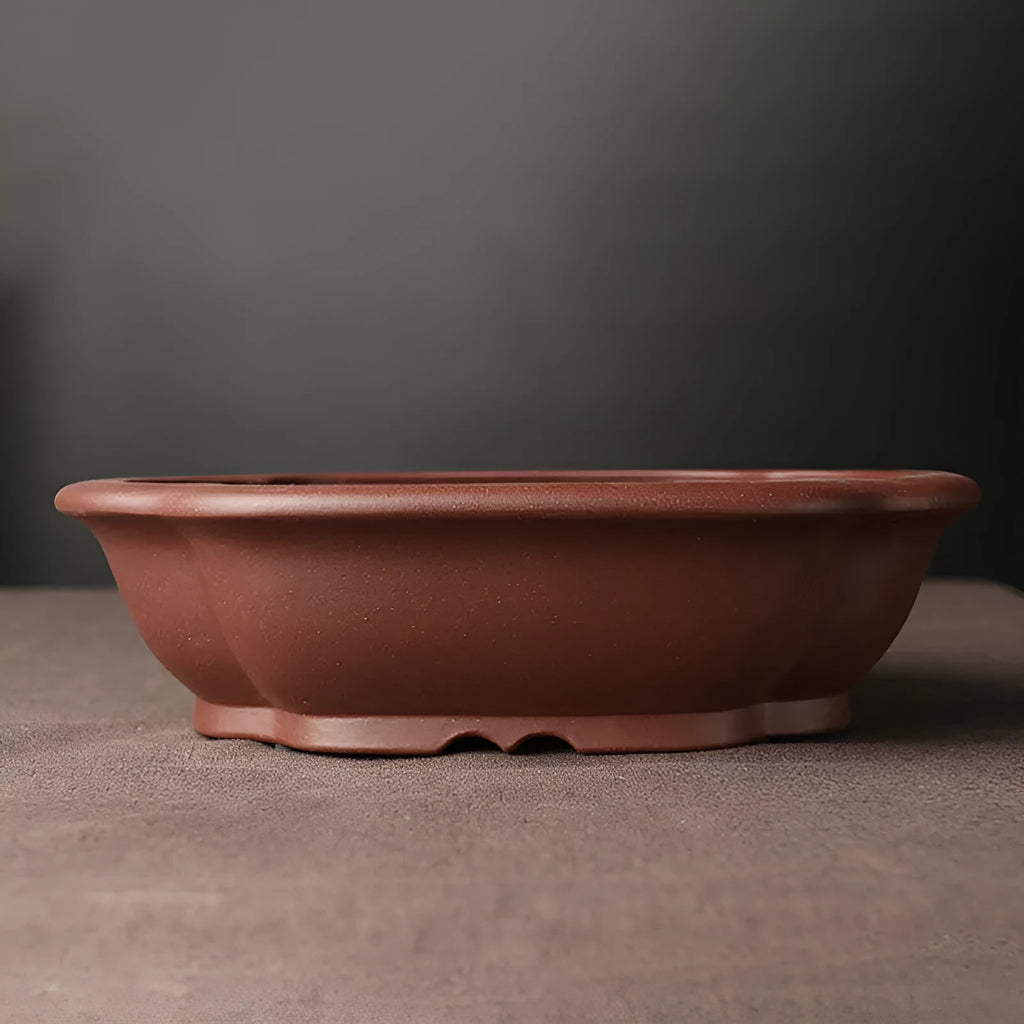 Handmade purple clay bonsai basin with traditional Chinese plain design measuring 25x20x7cm