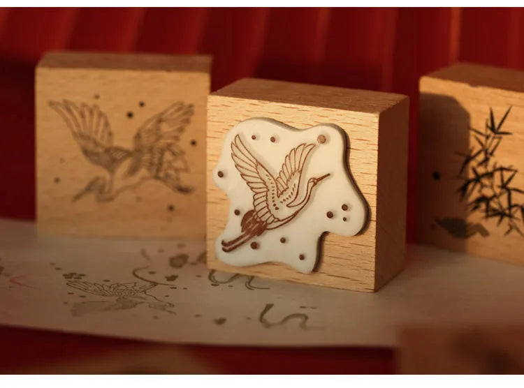 Mr. Paper wooden seal set with traditional crane designs in four colour variations for DIY printing projects