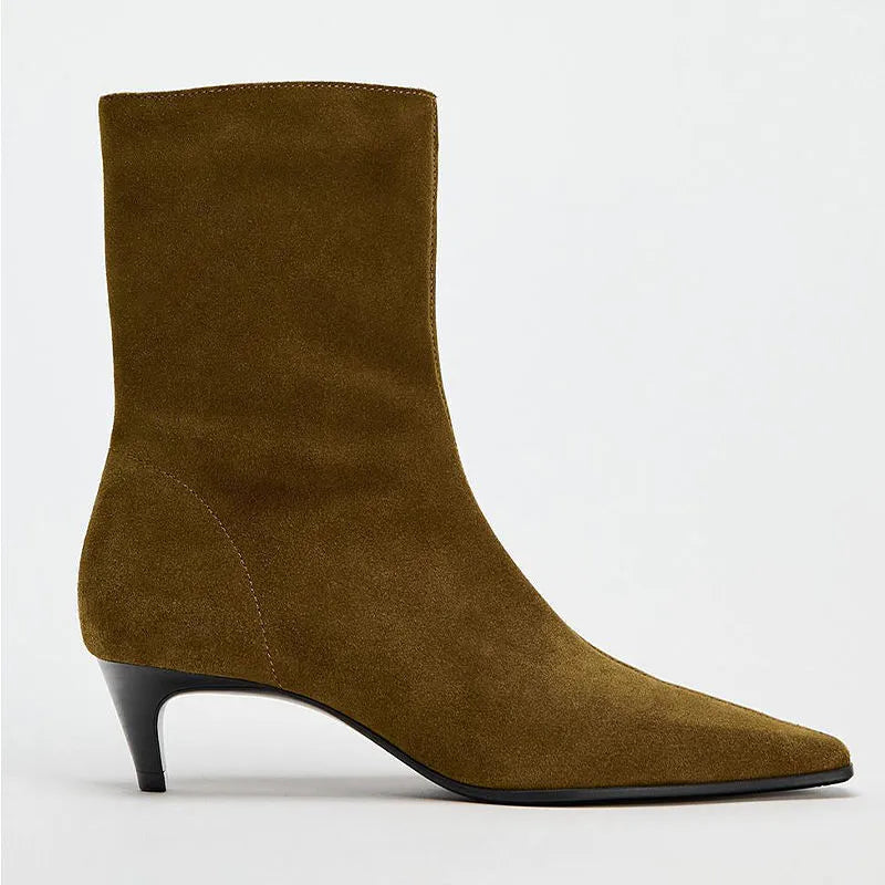 Brown women's square toe ankle boots with a side zip and mid kitten heel on a waterproof platform sole.