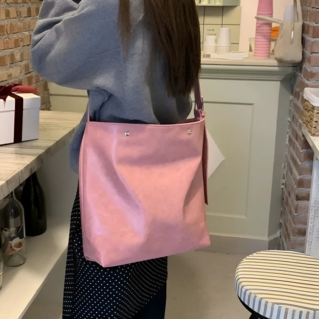 Corduroy commuter shoulder bag in pink or brown with PU lining and single strap