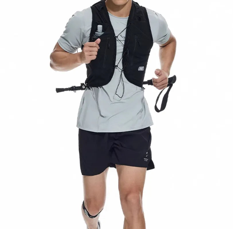 Black and blue four-point running shorts with laser stitching on stretch fabric.