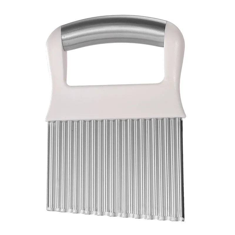 Stainless steel potato wave knife with a wavy blade on a kitchen worktop
