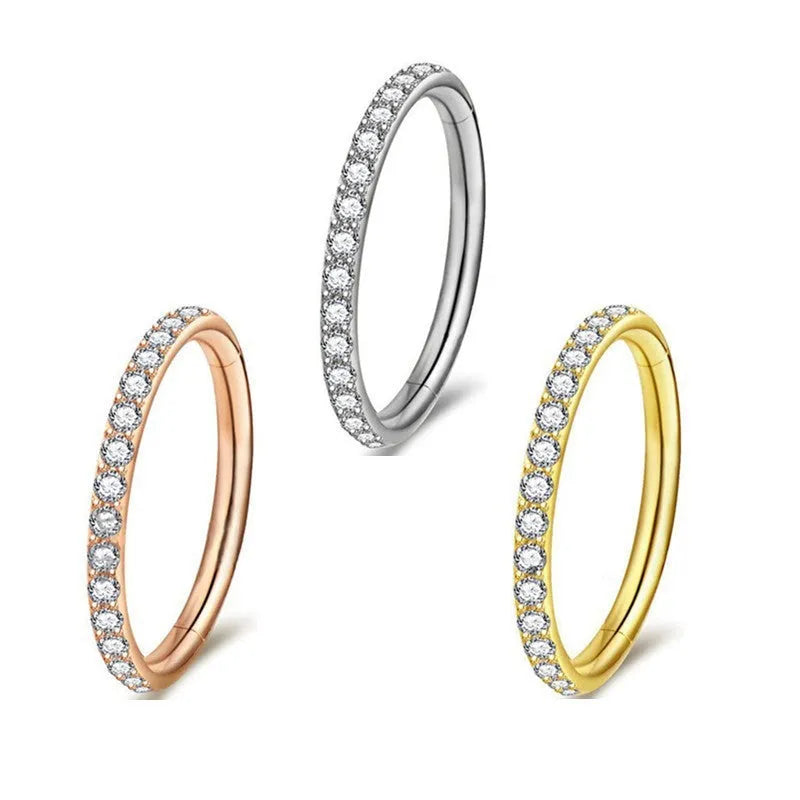 Stainless steel seamless nose ring with diamond detail showing round shape and colour finish options