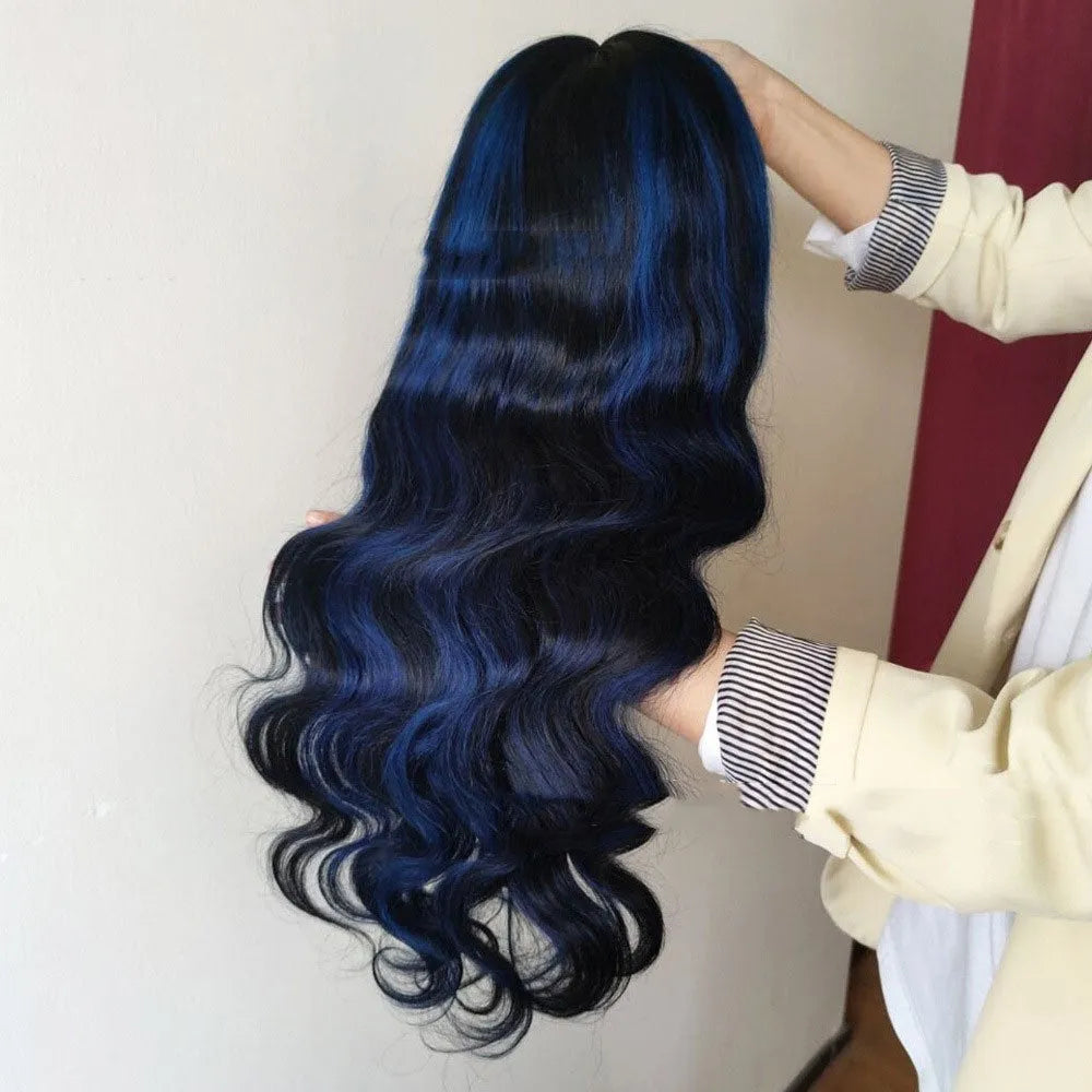 A woman wearing a long, real human hair lace front wig with a 4x4 transparent lace hairline.