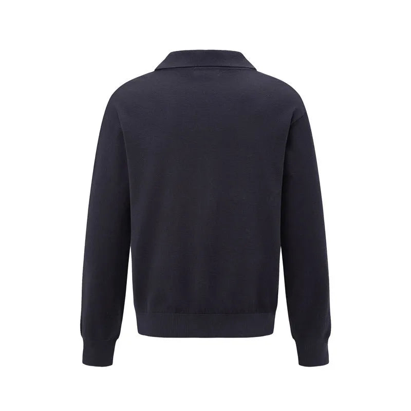 Loose fit acrylic blend pullover sweater in black, shown on a model for casual wear.