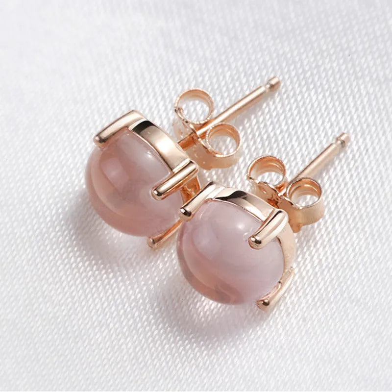 Women's Korean style drop-shaped stud earrings with synthetic Ross quartz stones in rose gold plating