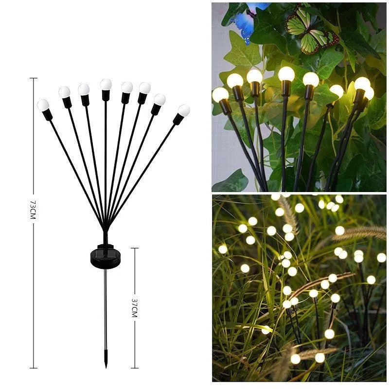 Solar-powered LED ground spike garden light with automatic sensor in lawn