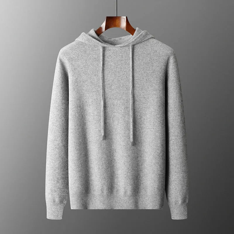 Men's light grey hooded cashmere sweatshirt and matching trousers laid flat as a complete casual set.