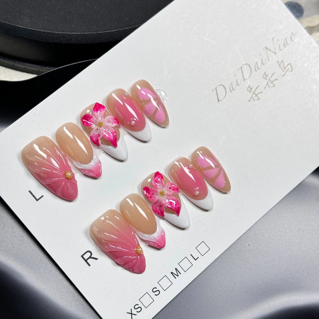 French style lily and fluid ice flower designs on transparent plastic wearable nail armour pieces in four sizes