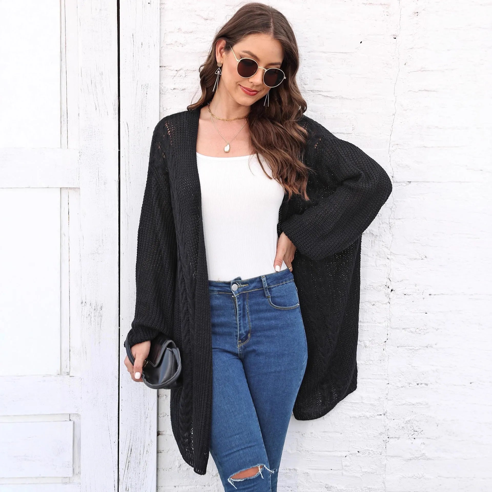 Women's loose acrylic sweater coat cardigan in army green, shown front view