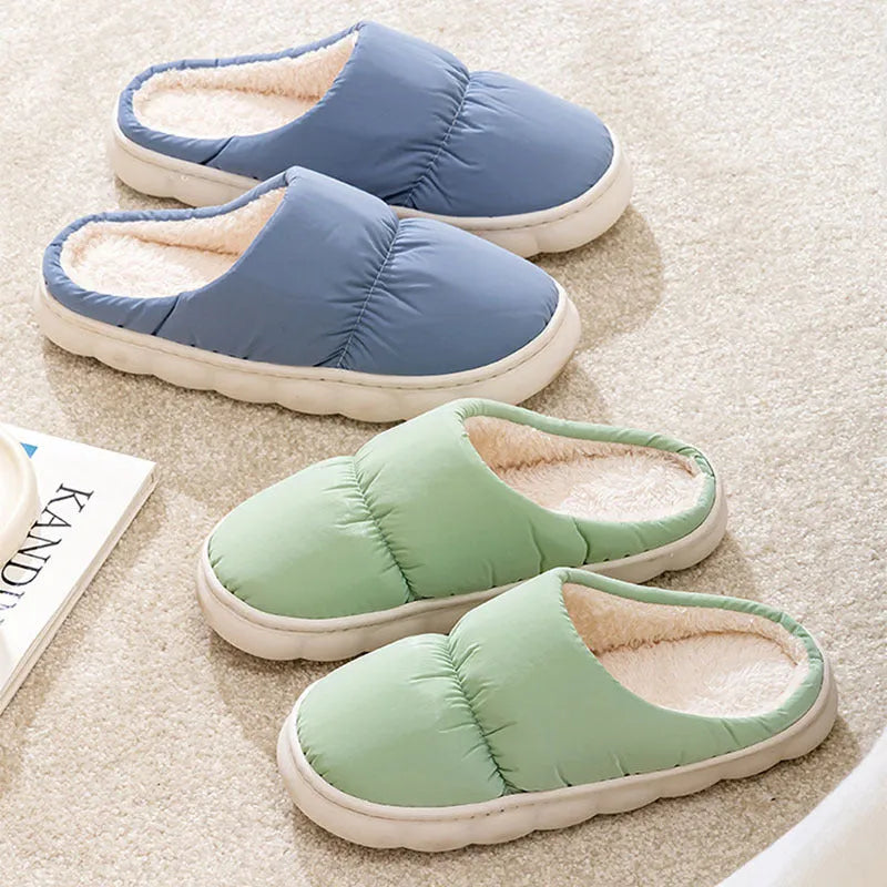 Down cotton slippers with artificial leather upper, rubber sole and plush lining in multiple colours