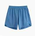 Black and blue four-point running shorts with laser stitching on stretch fabric.