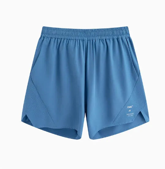 Black and blue four-point running shorts with laser stitching on stretch fabric.